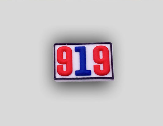 Malcontents 919 Raleigh area code Croc Charm/Jibbitz show the 919 in red and blue with a white square. 