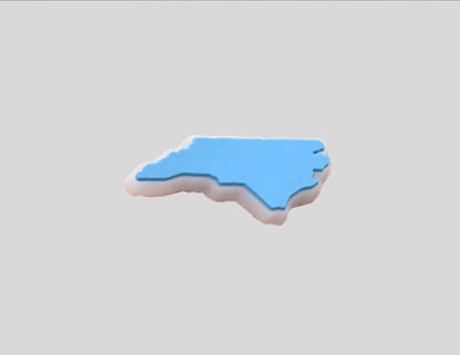 Malcontents North Carolina state Croc charm/Jibbitz: the shape of North Carolina in Carolina blue